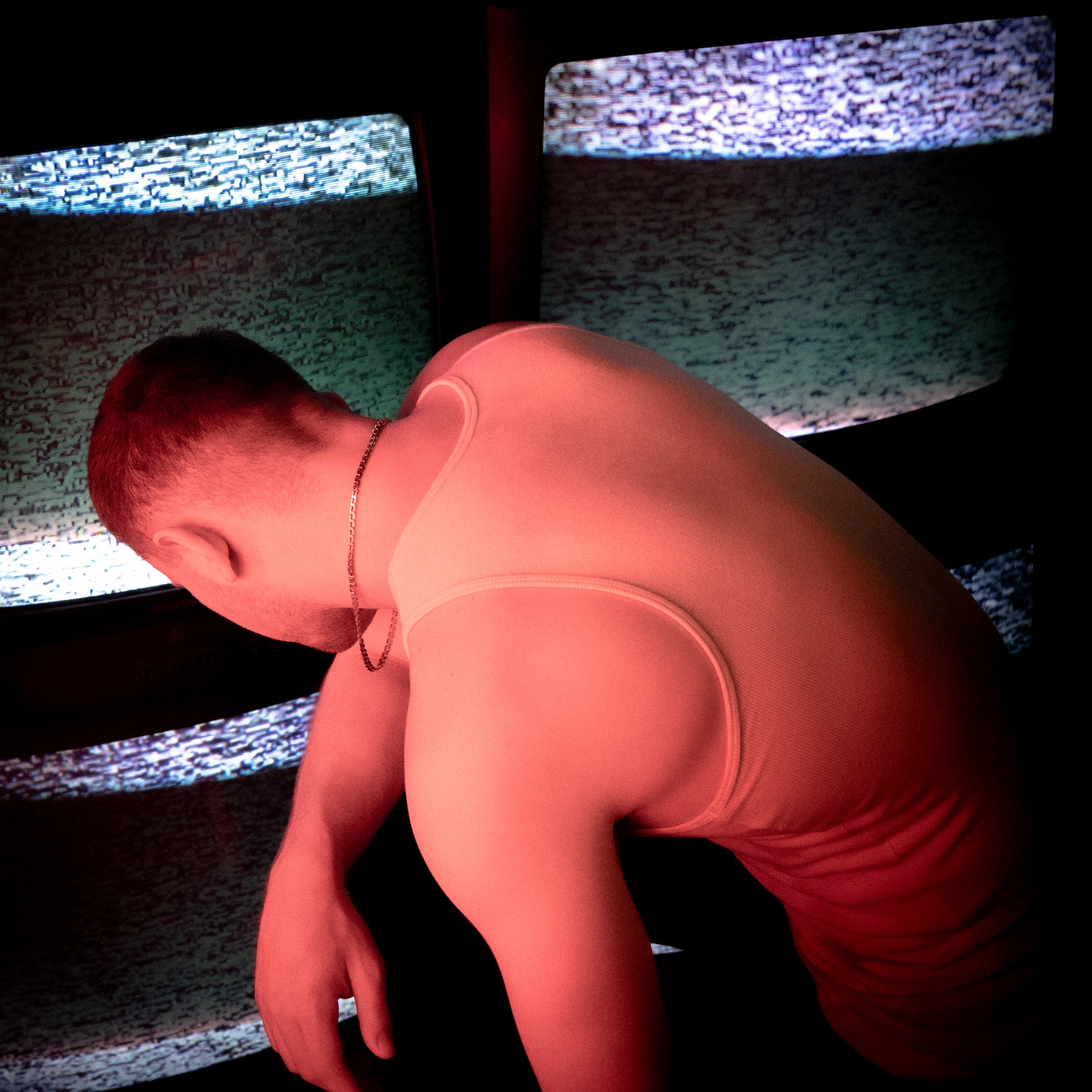 Singer performing under blue light